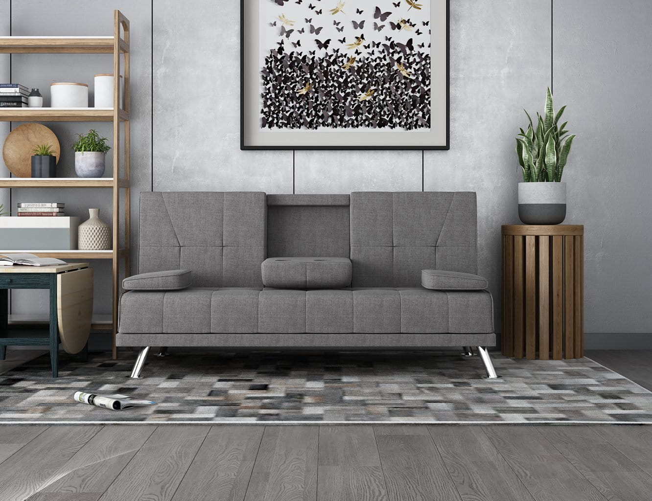 Grey fabric sofa bed in a modern living room with a decorative wall art piece.