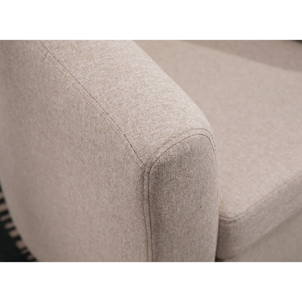 Close-up of a cream tub chair corner