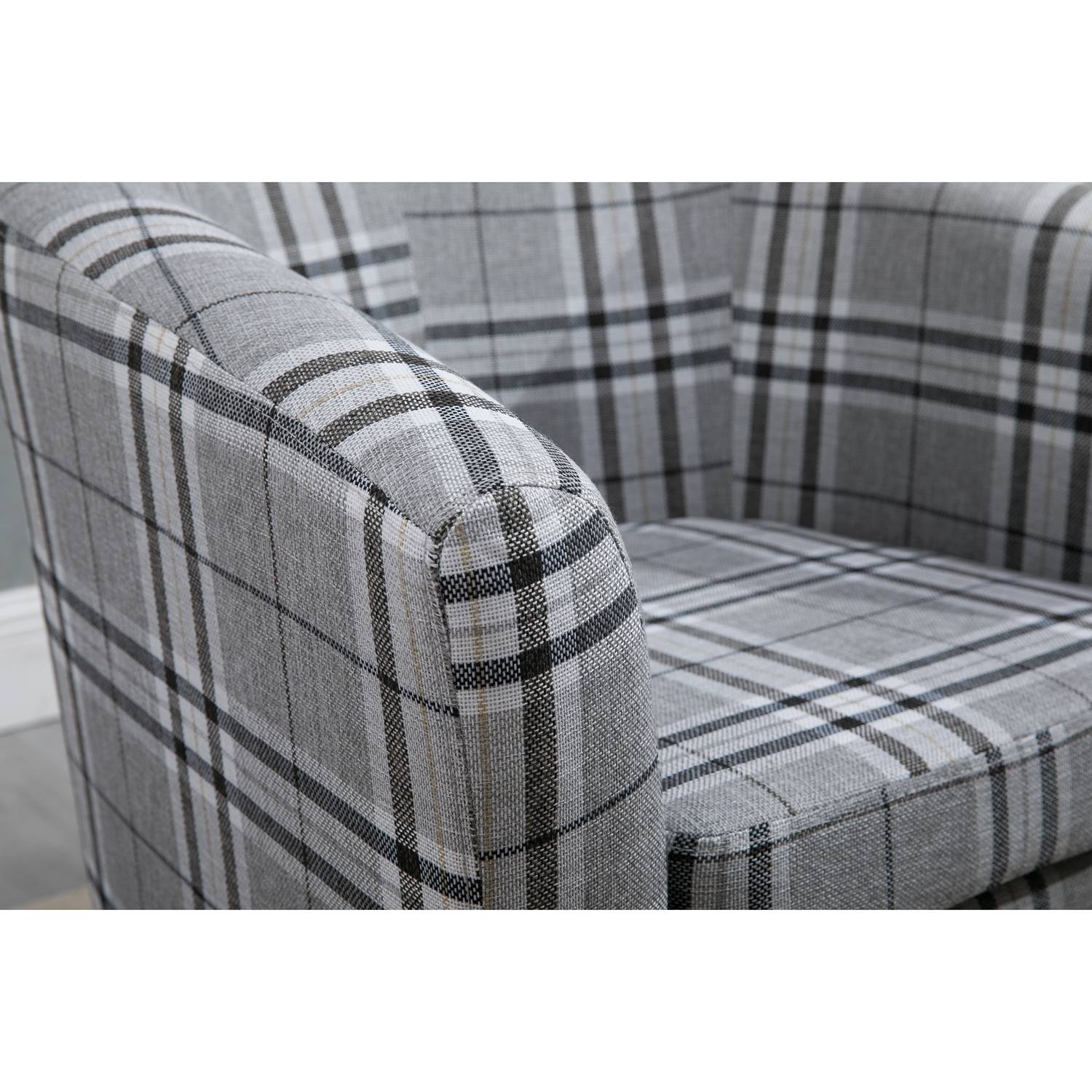Grey checkered tub chair armrest.