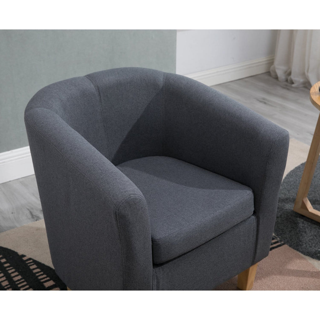Close up view of a fabric grey tub chair.