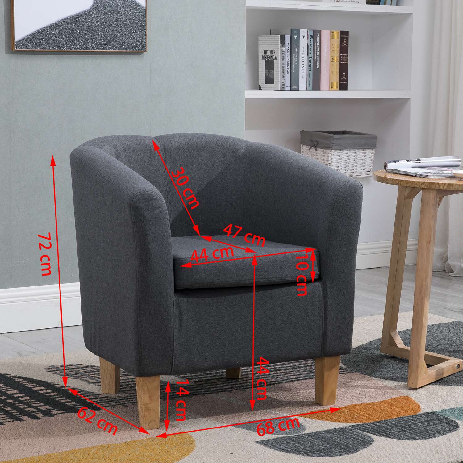Dimensions of a grey tub chair in a living room setting.