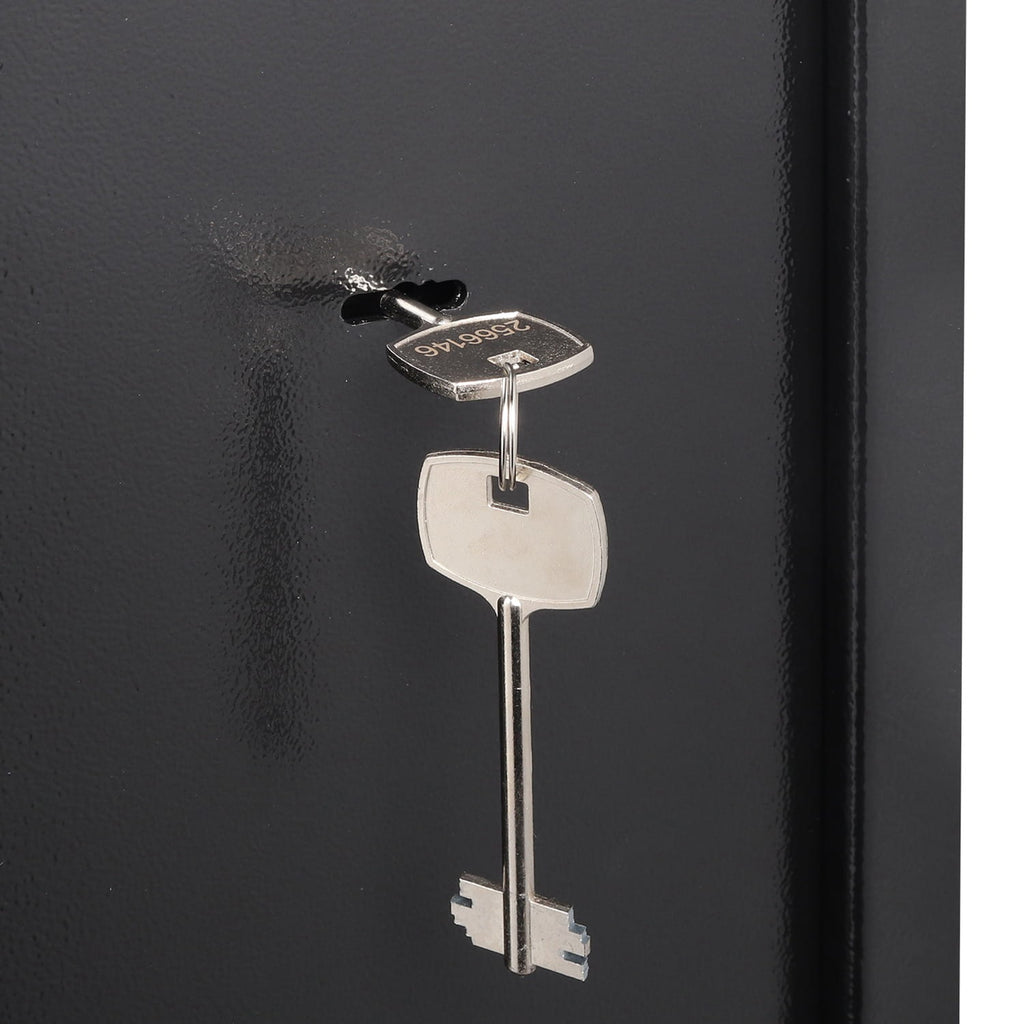 Close-up of a key on a black surface