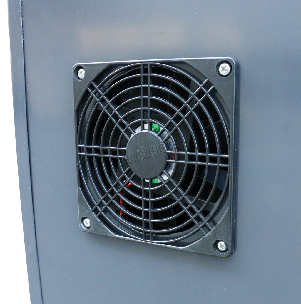 Black fan on a grey surface from an industrial parts washer. 