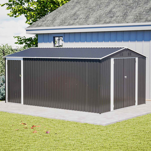 Large Garden shed with a grey roof and blue walls in front of a house.