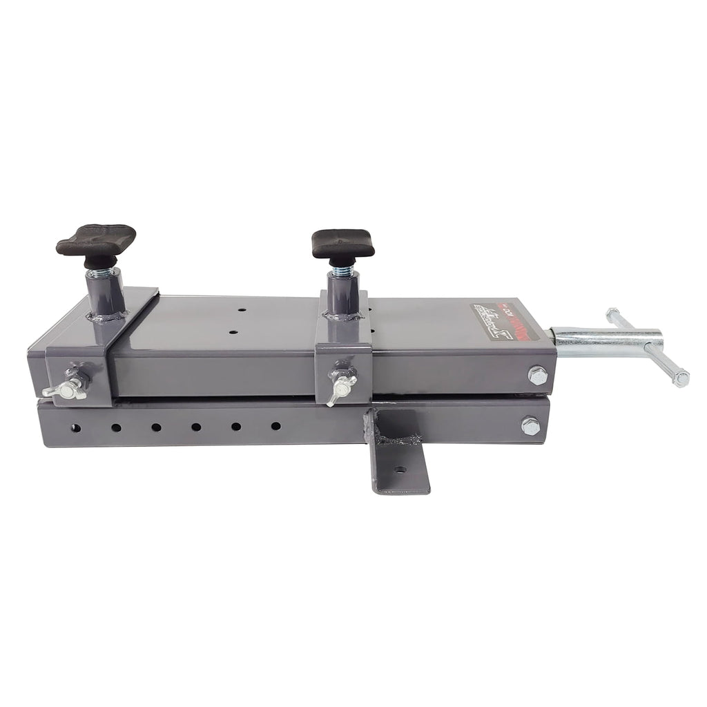 Metal tool or machine component from a motorbike scissor lift on a white background