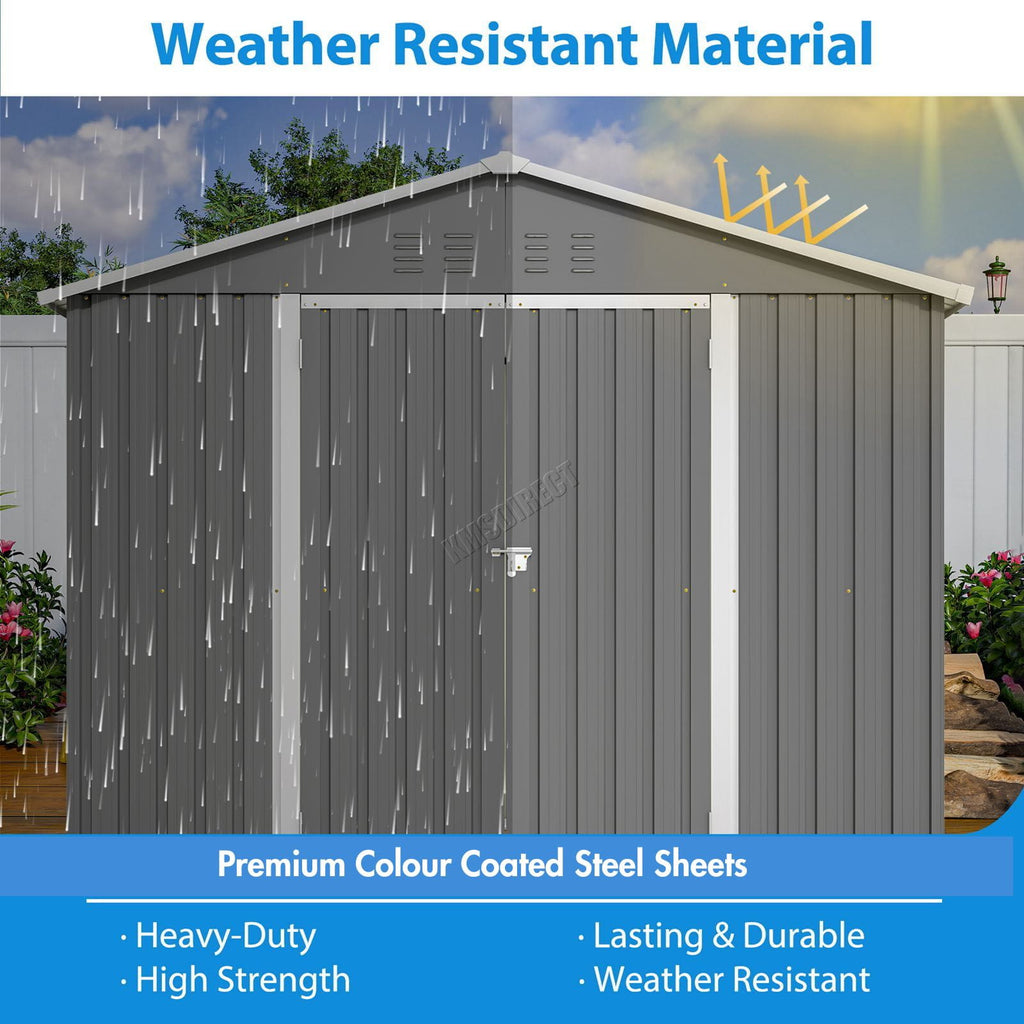 Grey metal garden shed with apex roof and rain simulation, emphasizing weather-resistant material, in a garden setting.