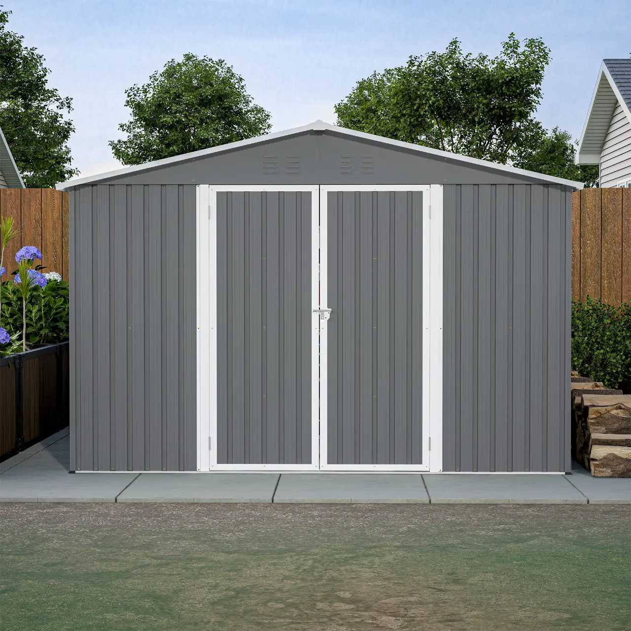 Grey metal garden shed with an apex roof in a backyard setting.