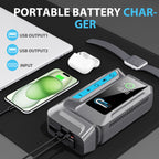 Portable jump starter and battery charger with smartphone, watch, and earbuds on a dark surface