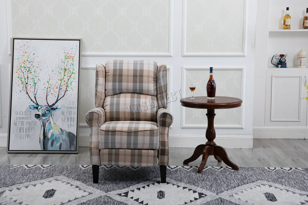 Beige checkered recliner armchair in a room with a deer painting and small table.