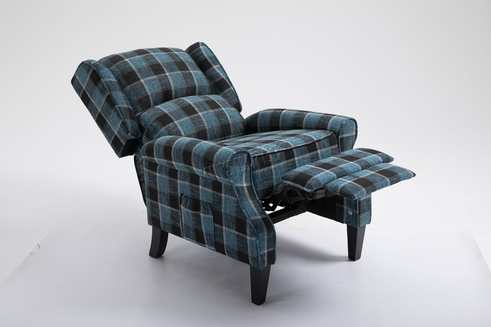 blue checkered recliner armchair on a white background