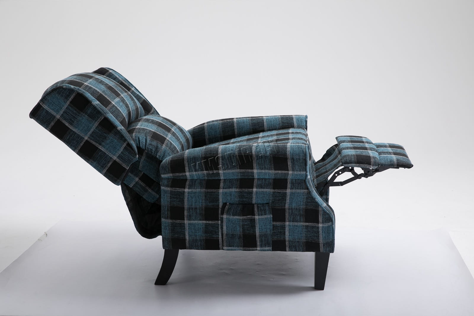 Blue checkered recliner armchair on a white background