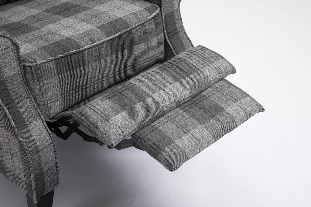 Grey checkered recliner armchair with reclining mechanism on a white background