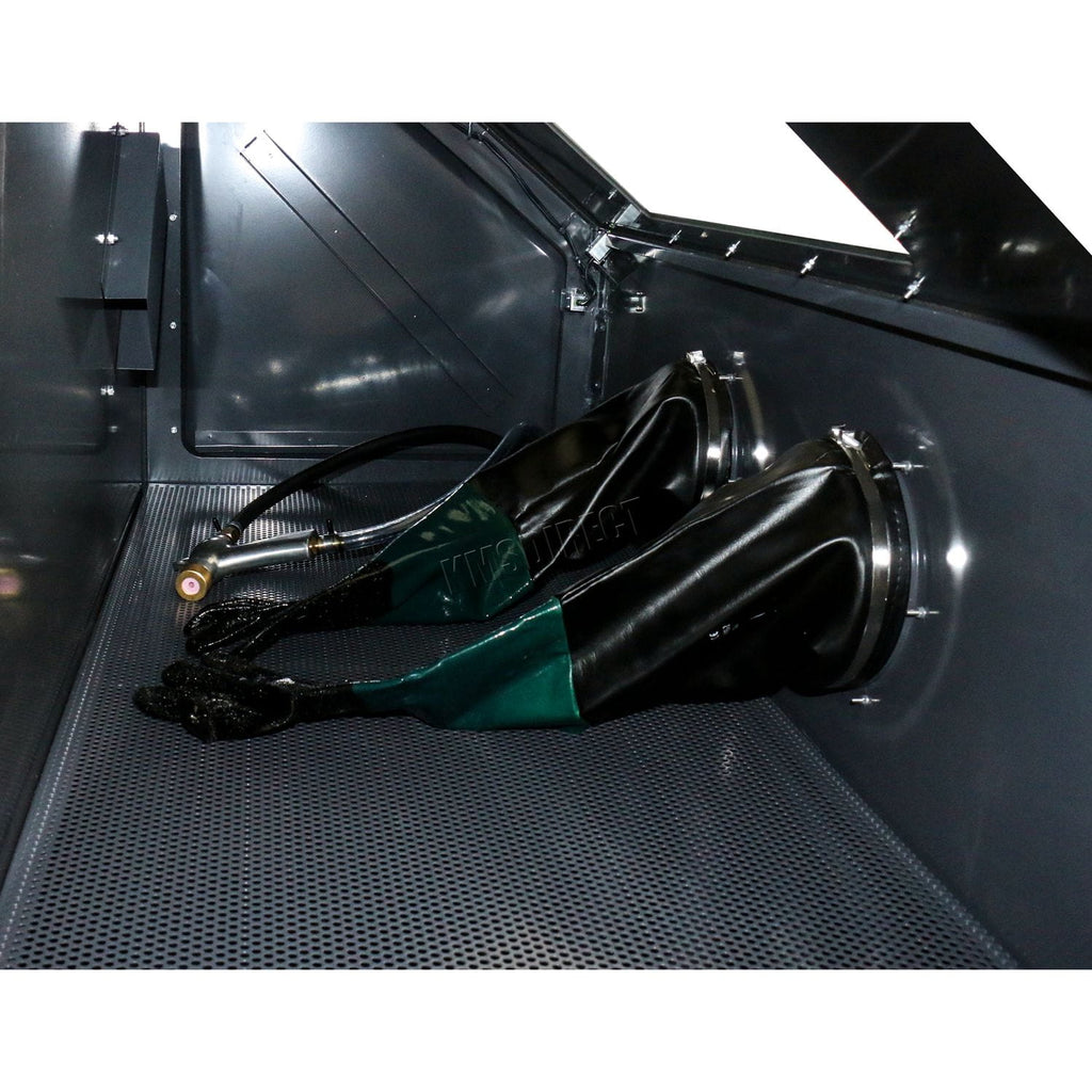 Close-up of a vinyl gloves inside of a sandblasting machine