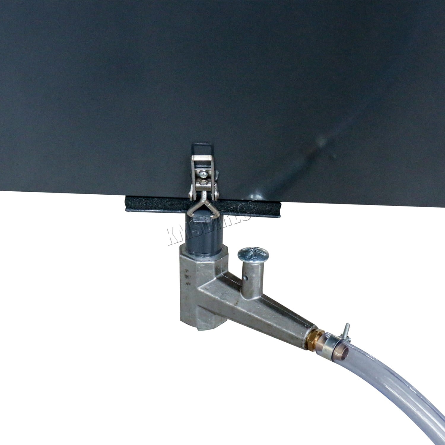 Metal valve with hose attachment on a black background