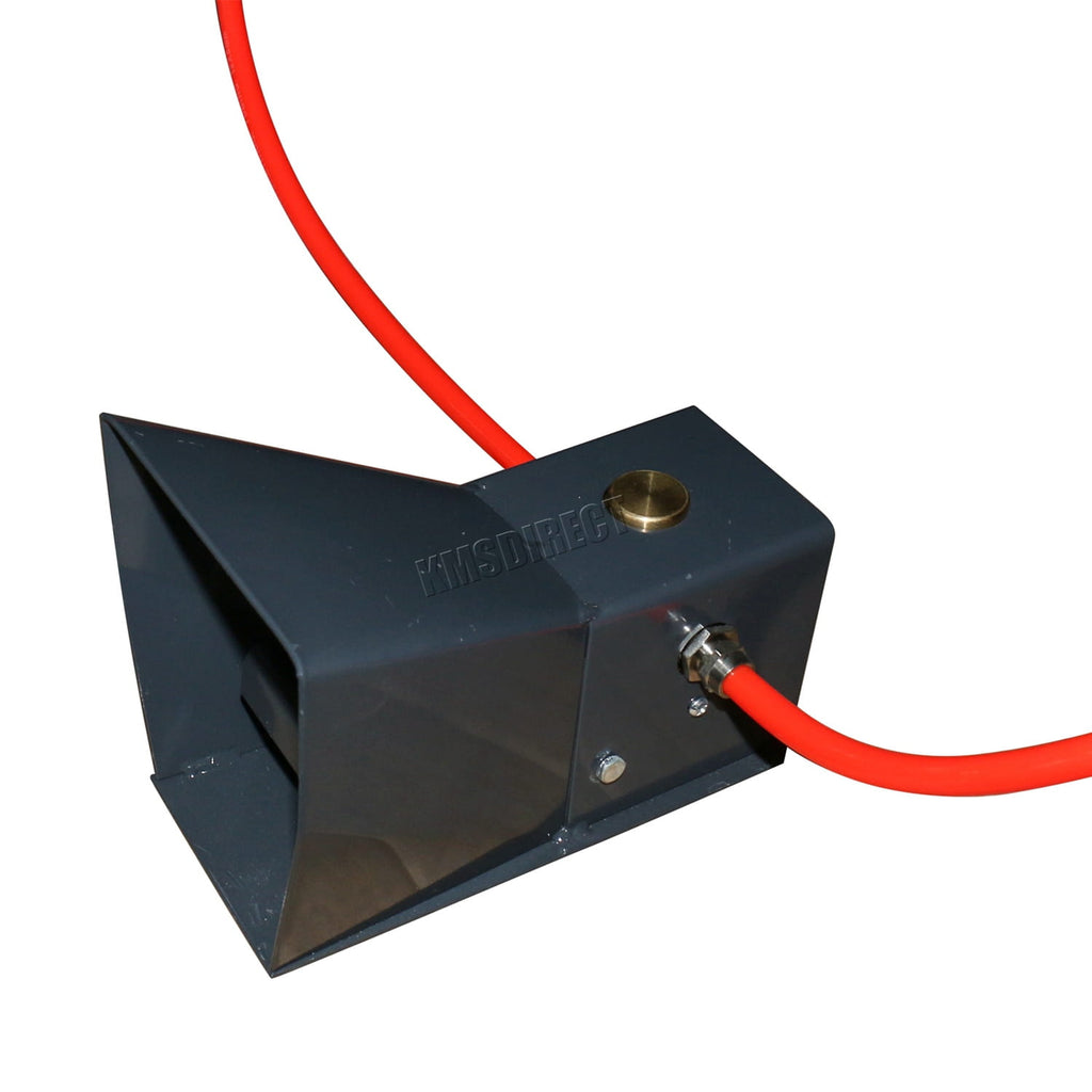 Black metal device with red cable from a sandblasting machine on a white background
