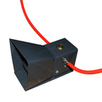 Black metal device with red cable from a sandblasting machine on a white background