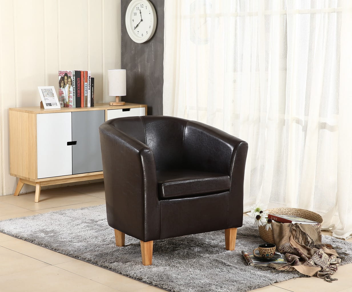 Brown faux leather armchair in a living room setting with a cabinet and clock in the background.