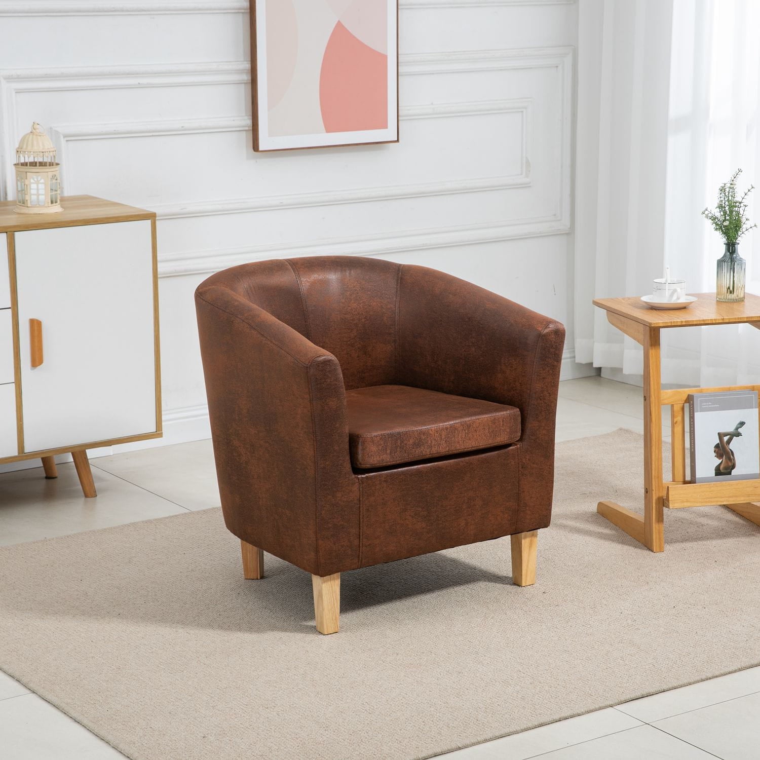 Brown faux leather armchair in a modern living room setting with side tables and decor.