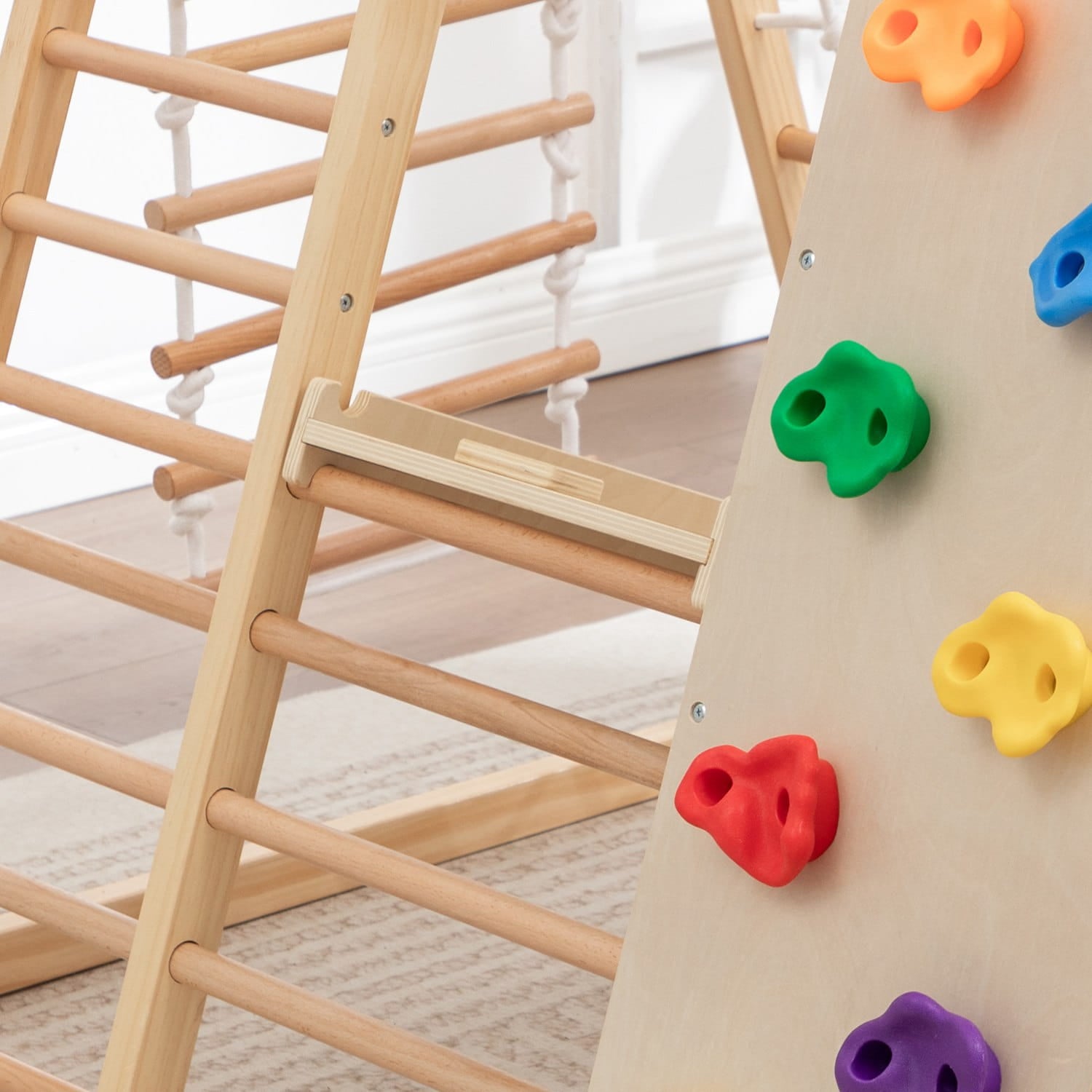 image of rock climbing from a wooden climbing frame.