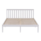 White wooden double bed frame with slatted design on a white background.