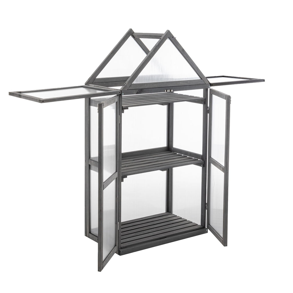 Small wooden greenhouse with transparent roof and glass panels on a white background