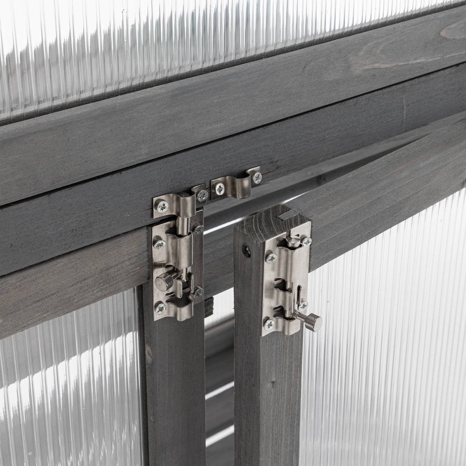 Close-up of a wooden greenhouse and metal door hinge on a transparent background