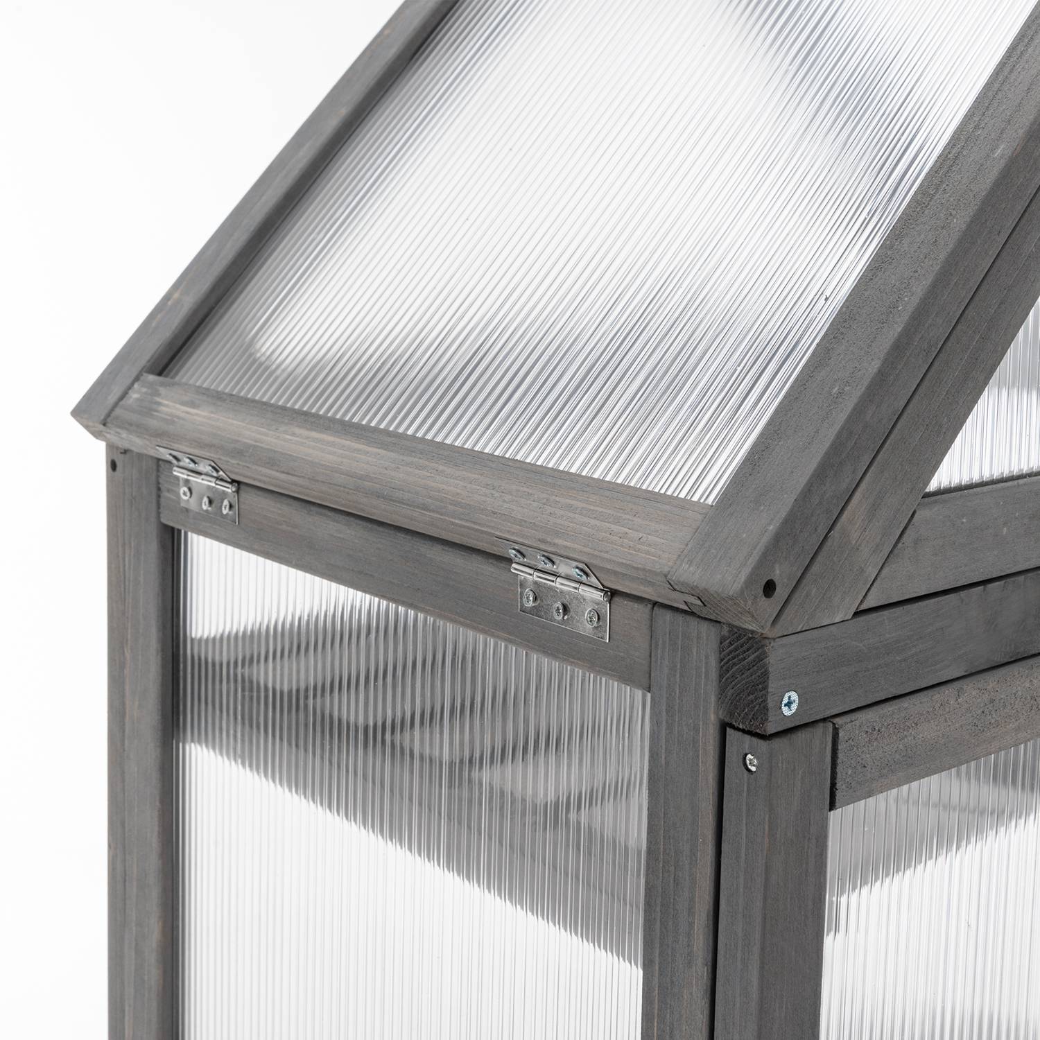 Close-up of a wooden greenhouse with transparent roof and sides on a white background